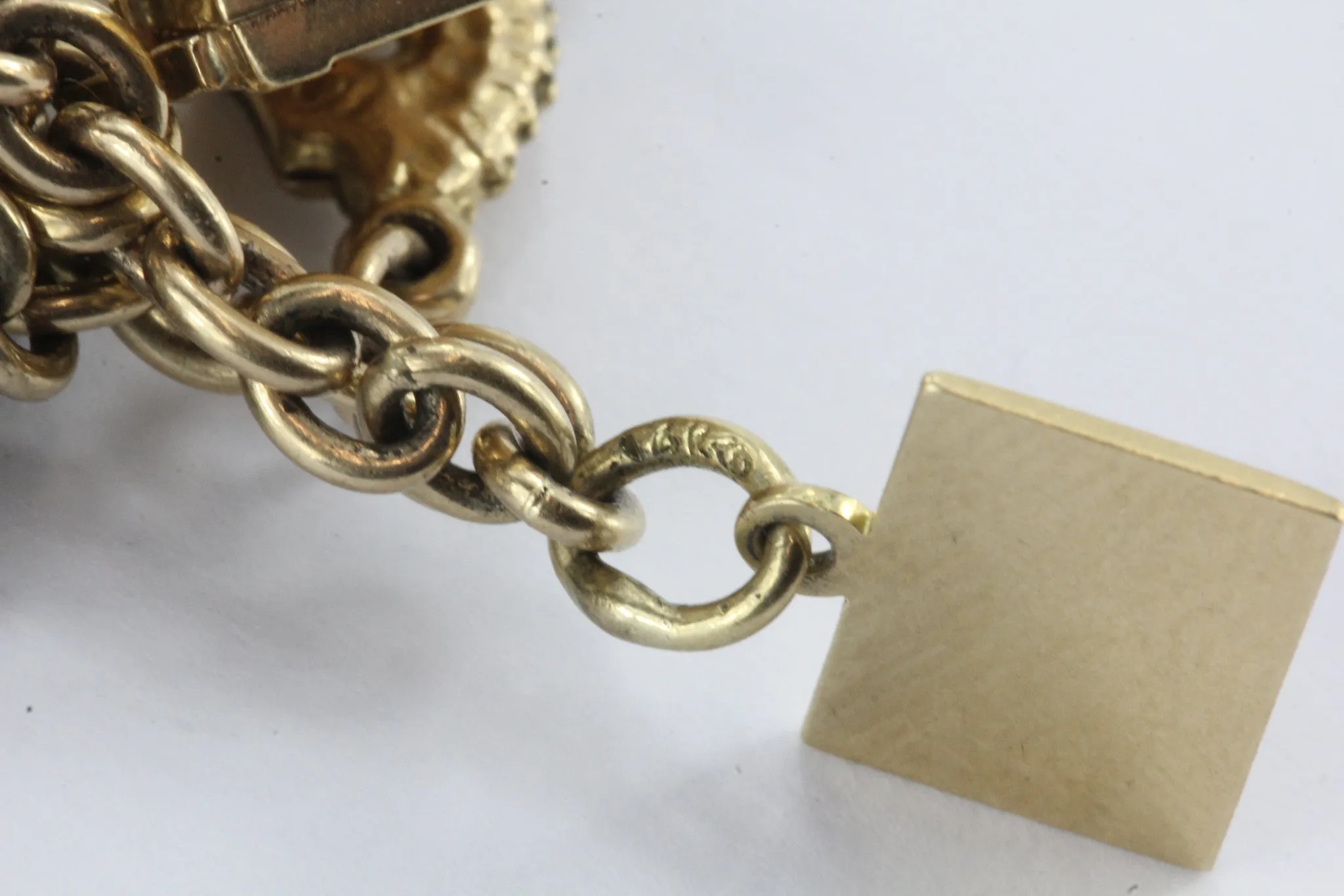 Antique 1940's 14k Gold Loaded 26 Charm Bracelet w Cartier & Tiffany Co Charm