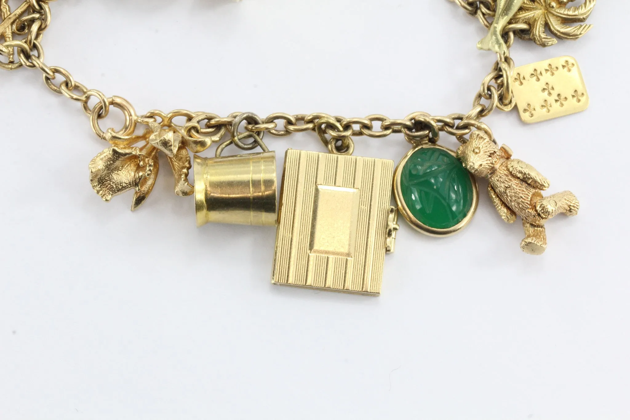 Antique 1940's 14k Gold Loaded 26 Charm Bracelet w Cartier & Tiffany Co Charm